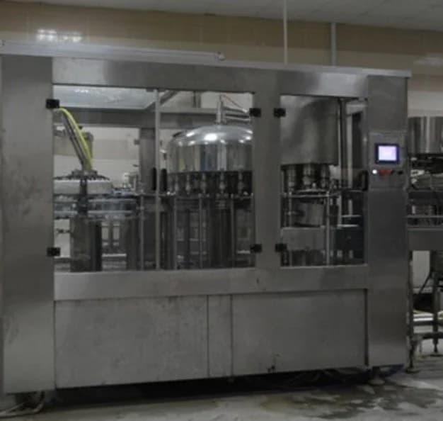 Stainless-steel production machinery within an industrial facility.