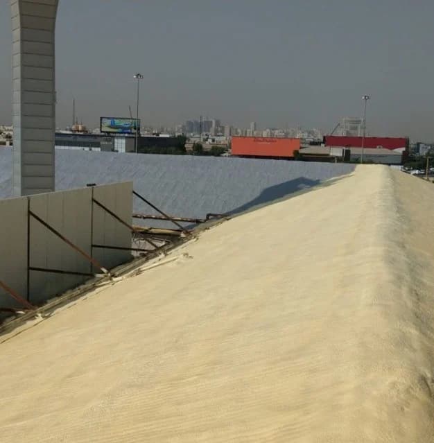 A prepared external route alongside the perimeter of an industrial site.